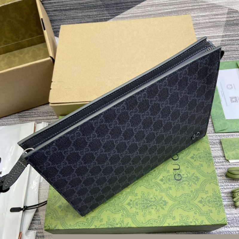 G*u*i clutch bags